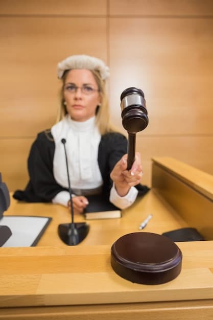 A gavel hitting a sound block on a judge's bench in a courtroom setting, symbolizing the legal battles and decisions involved in divorce cases.