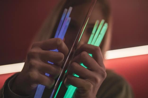 Close-up of a smartphone screen showing a significant spike in streaming data for an artist immediately after an award show performance. The graph illustrates the sudden increase in plays.
