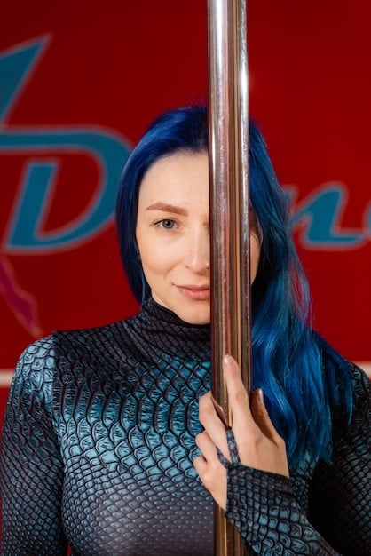 A close-up photograph of an actress of color accepting an award at the 2025 SAG Awards, displaying a sense of pride and accomplishment.