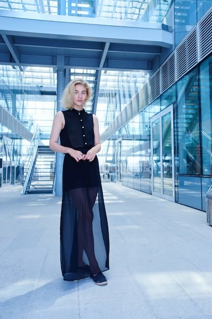 Cate Blanchett in a sophisticated Armani Privé gown at the Cannes Film Festival. The gown features intricate detailing and a flattering silhouette, complemented by minimalist jewelry and a sleek hairstyle.