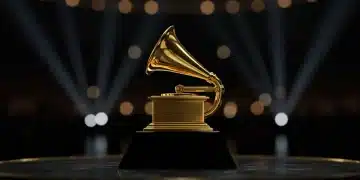 Golden Grammy trophy on a spotlighted stage, symbolizing music awards and anticipation for 2026.