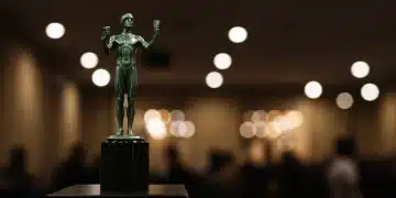 SAG Awards 2026: Navigating Ensemble Recognition Golden SAG Awards statuette on a pedestal, representing excellence in ensemble acting recognition.