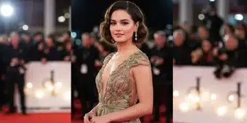 Celebrity on red carpet with perfect hair and makeup, embodying luxury beauty.
