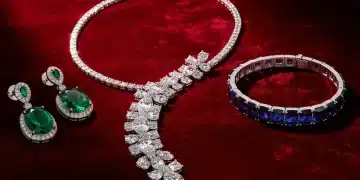 Luxurious diamond and gemstone jewelry on red velvet, symbolizing red carpet elegance.